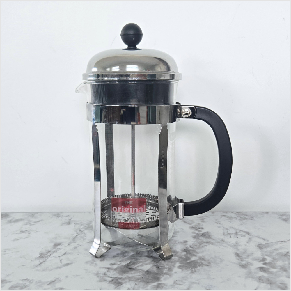 Bodum Chambord French press coffee maker with borosilicate glass and stainless steel frame.