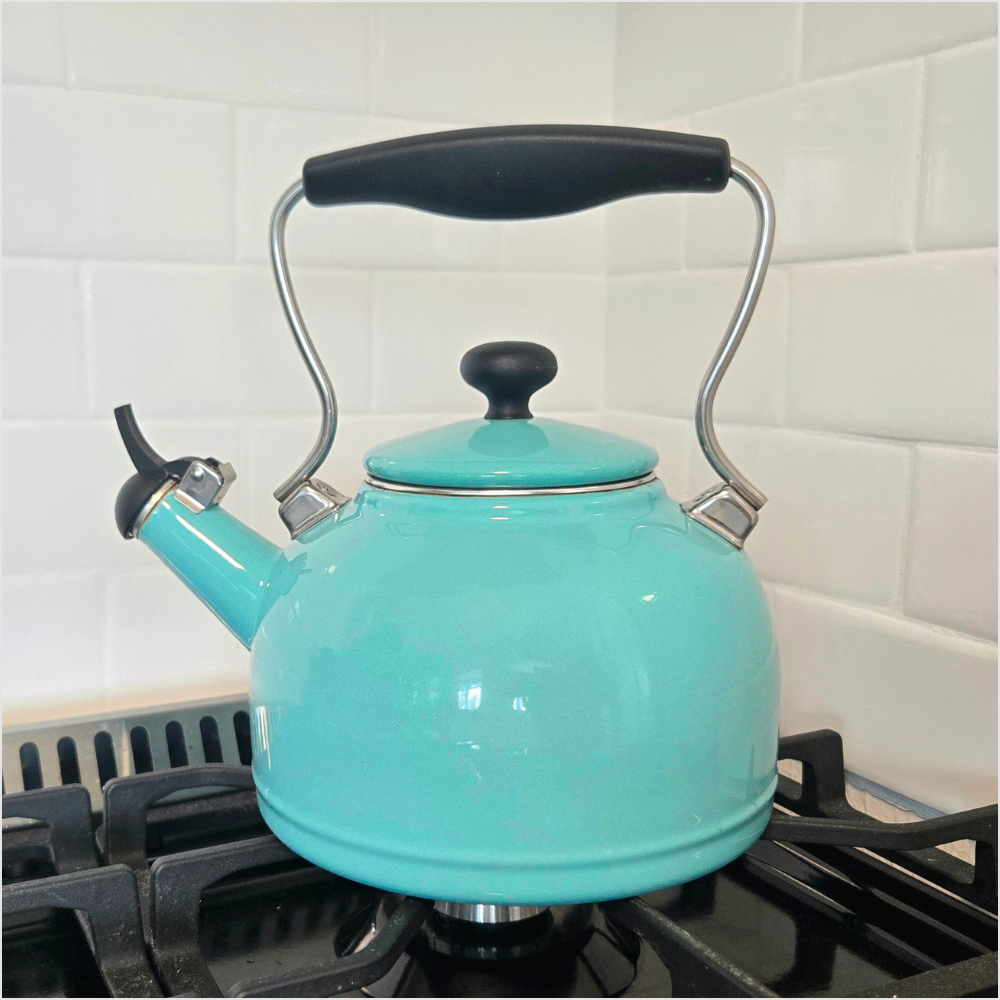 Chantal vintage aqua tea kettle with enamel-on-steel design for heating water on the stovetop.
