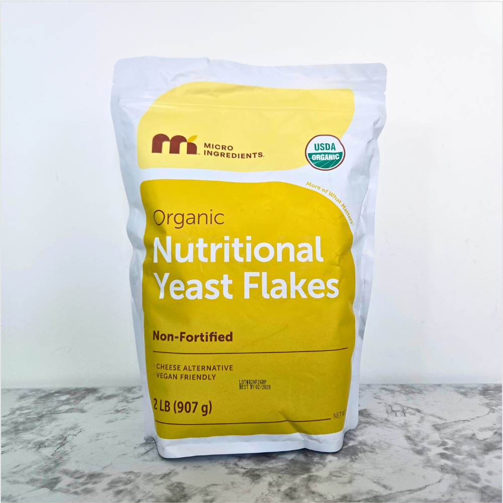 Embrobi product thumbnail for organic non-fortified nutritional yeast flakes, a pantry add-in for savory cheesy flavor and nourishing everyday meals.