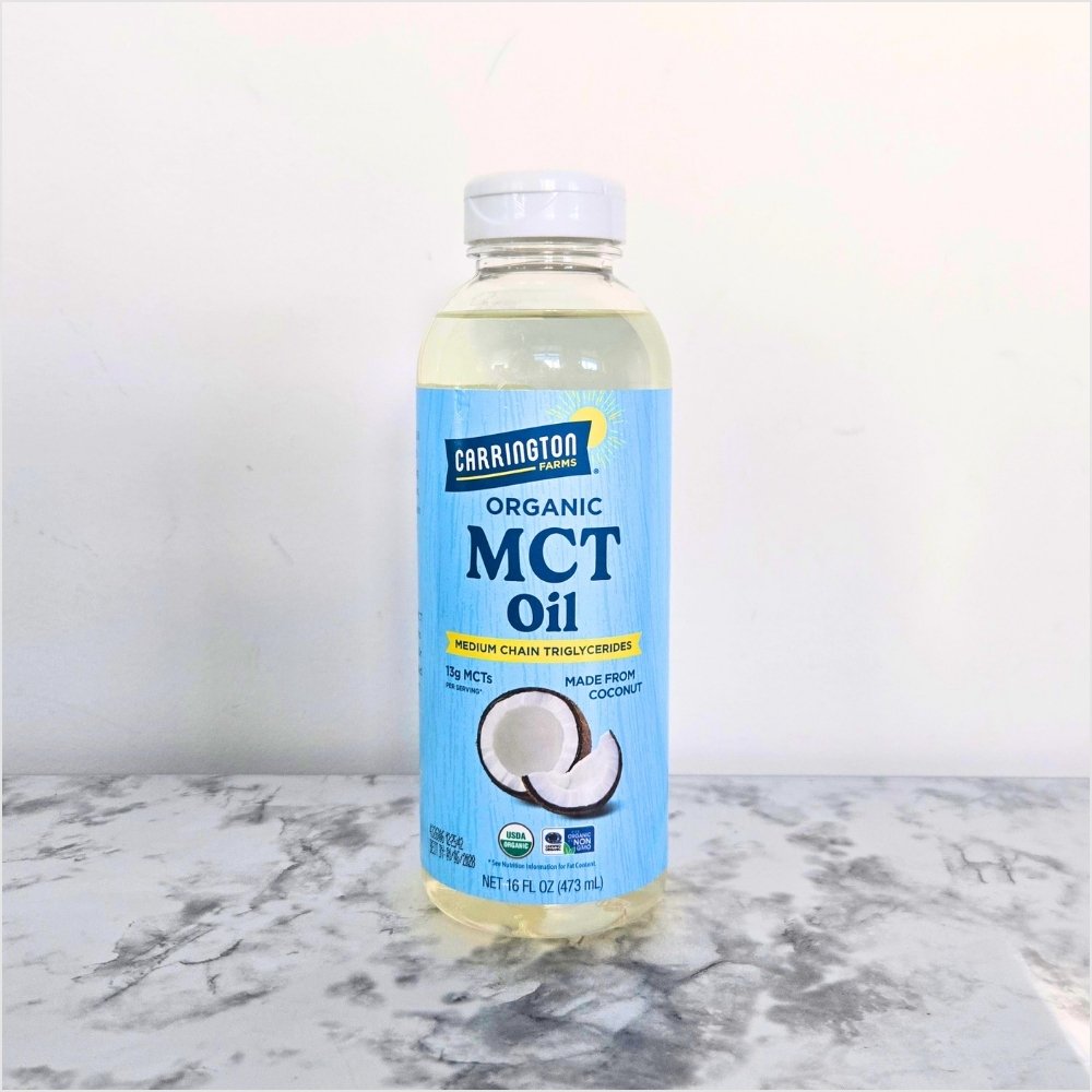 Carrington Farms organic MCT oil in a 16 ounce bottle, a cold-pressed oil for adding to coffee, smoothies and cooking.