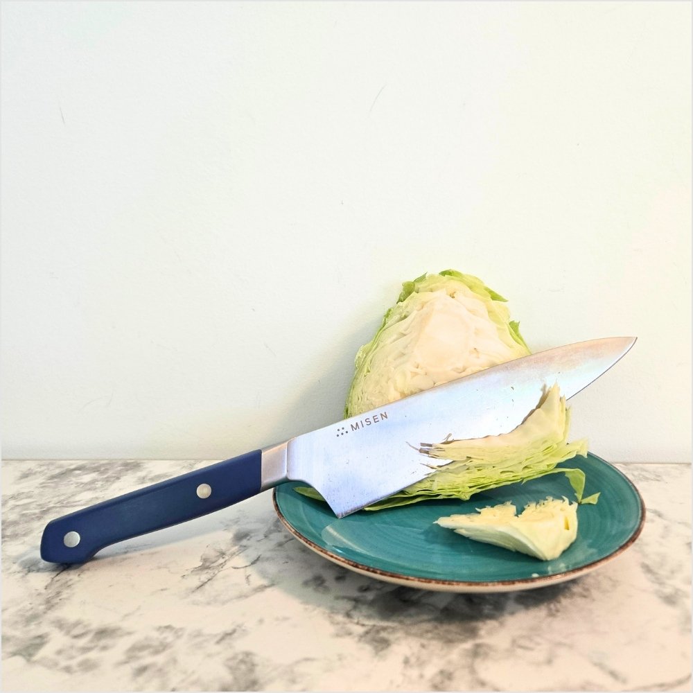Misen chef's knife with an 8 inch blade and blue handle, an all-purpose kitchen knife for cabbage, vegetables, meat and more.